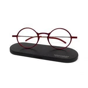 Gafas de lectura modelo Zipo en color rojo sobre su estuche de aluminio ultrafino Contour